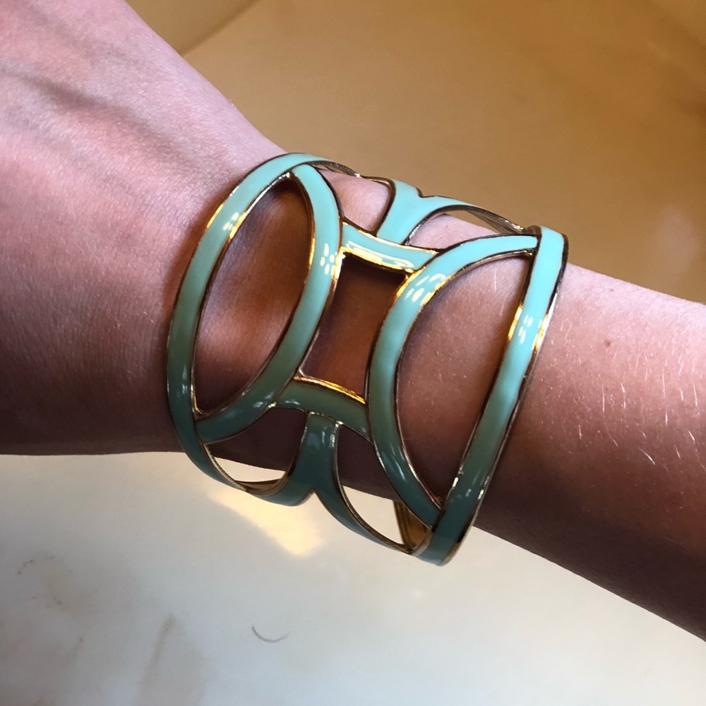 Gold and turquoise bangle bracelet.